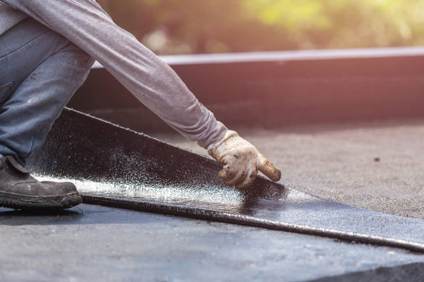 Professional Waterproofing technician working in Orient, NY